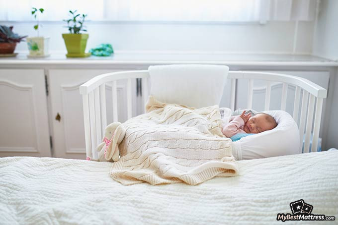 newborn sleeping in crib right away